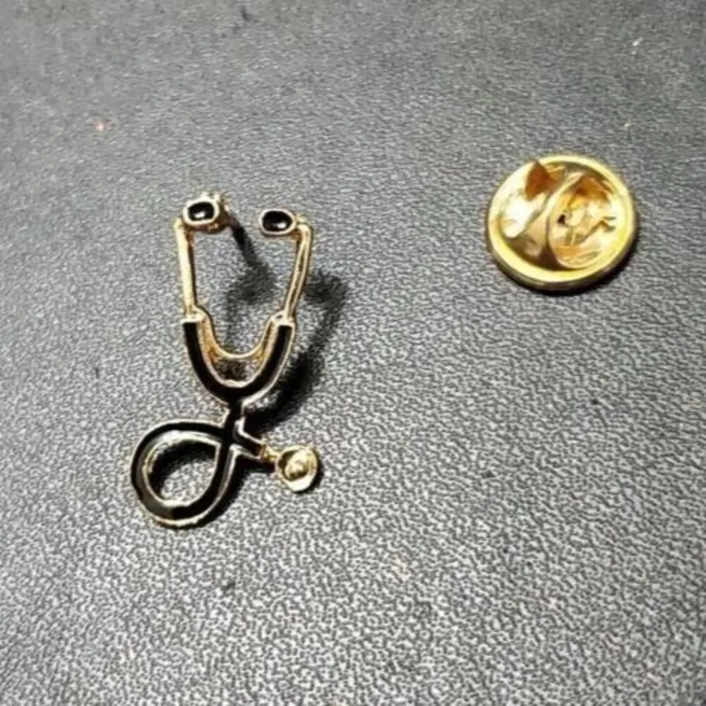 Gold tone stethoscope pin